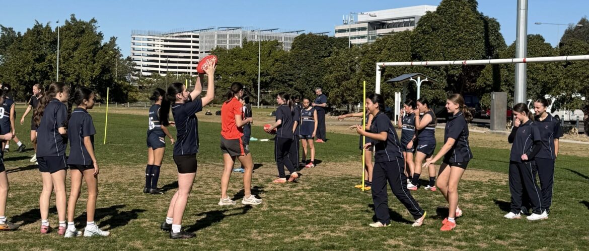 Our Junior AFL team participating in their skills session with The Sydney Swans last week